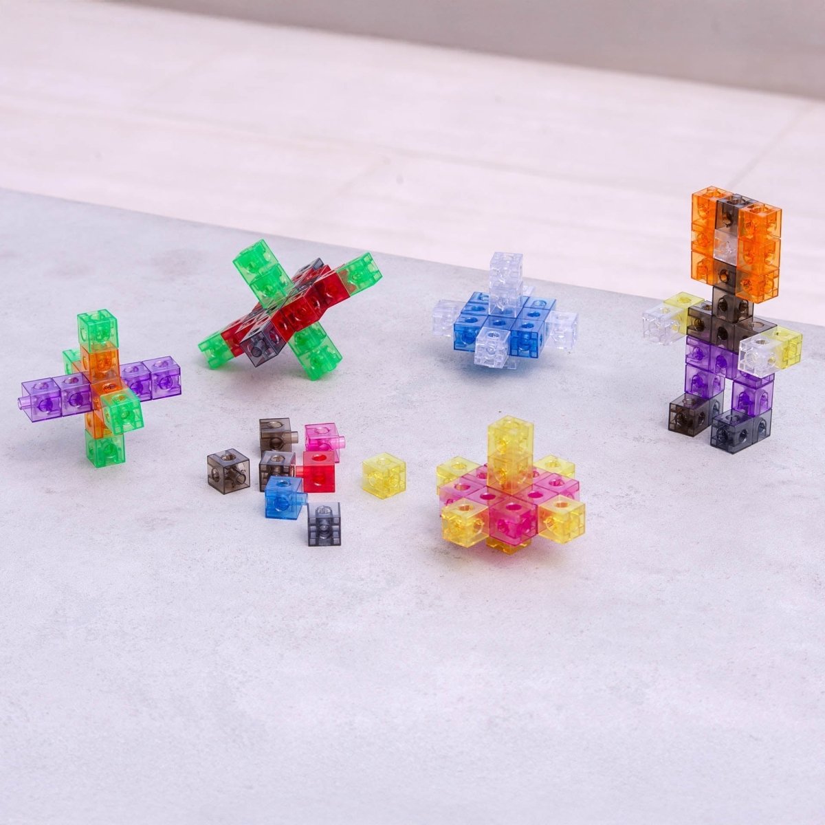 Translucent Colour Linking Cubes – for children, available at Learning Bugs UK
