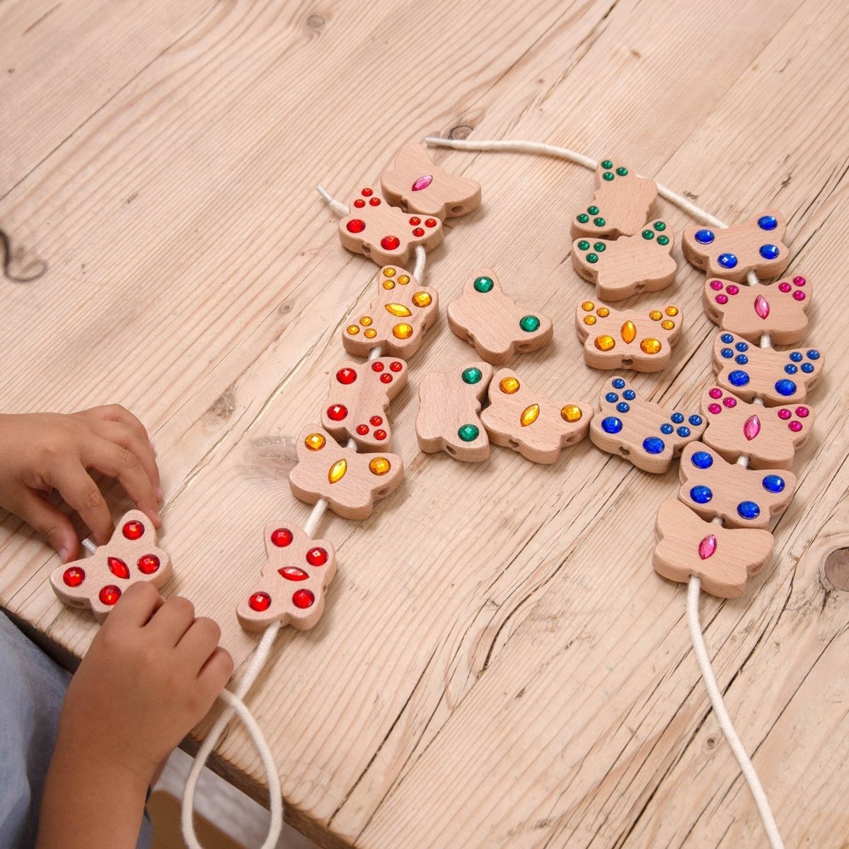 Butterfly Lacing Jewels – for children, available at Learning Bugs UK