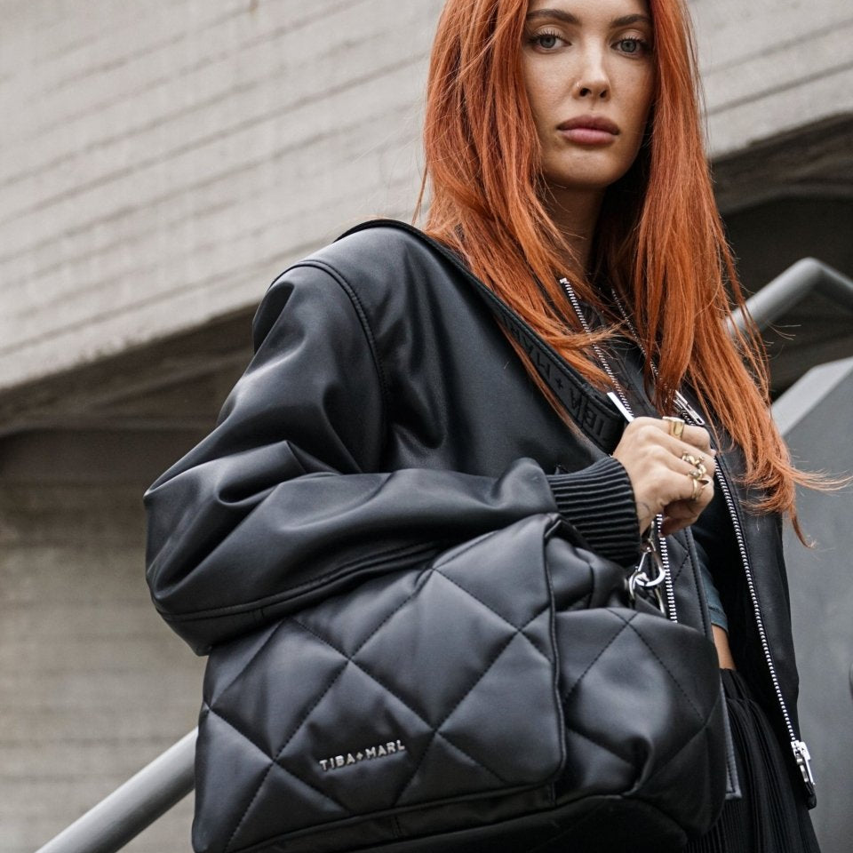 Nova Eco Compact Changing Bag Black Quilted Faux Leather – Compact Changing Bag for children, available at Learning Bugs UK