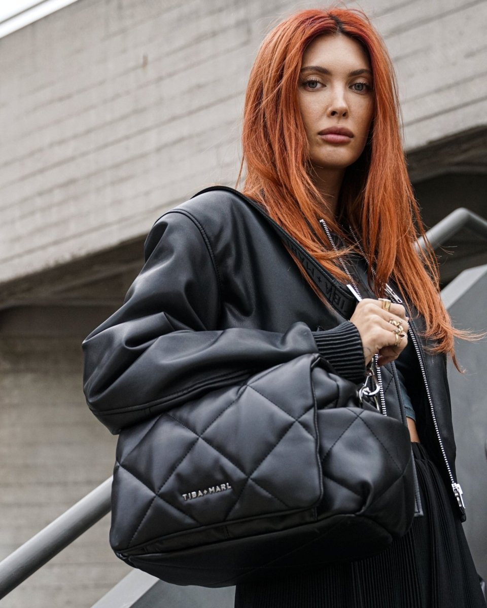 Nova Eco Compact Changing Bag Black Quilted Faux Leather – Compact Changing Bag for children, available at Learning Bugs UK