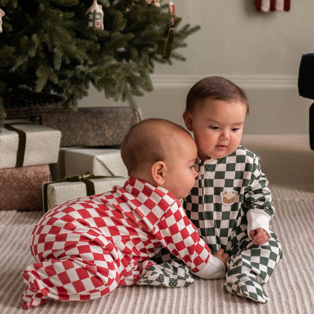 Avery Row Christmas Baby Jersey Sleepsuit - Red Checkerboard – Baby Clothing for children, available at Learning Bugs UK
