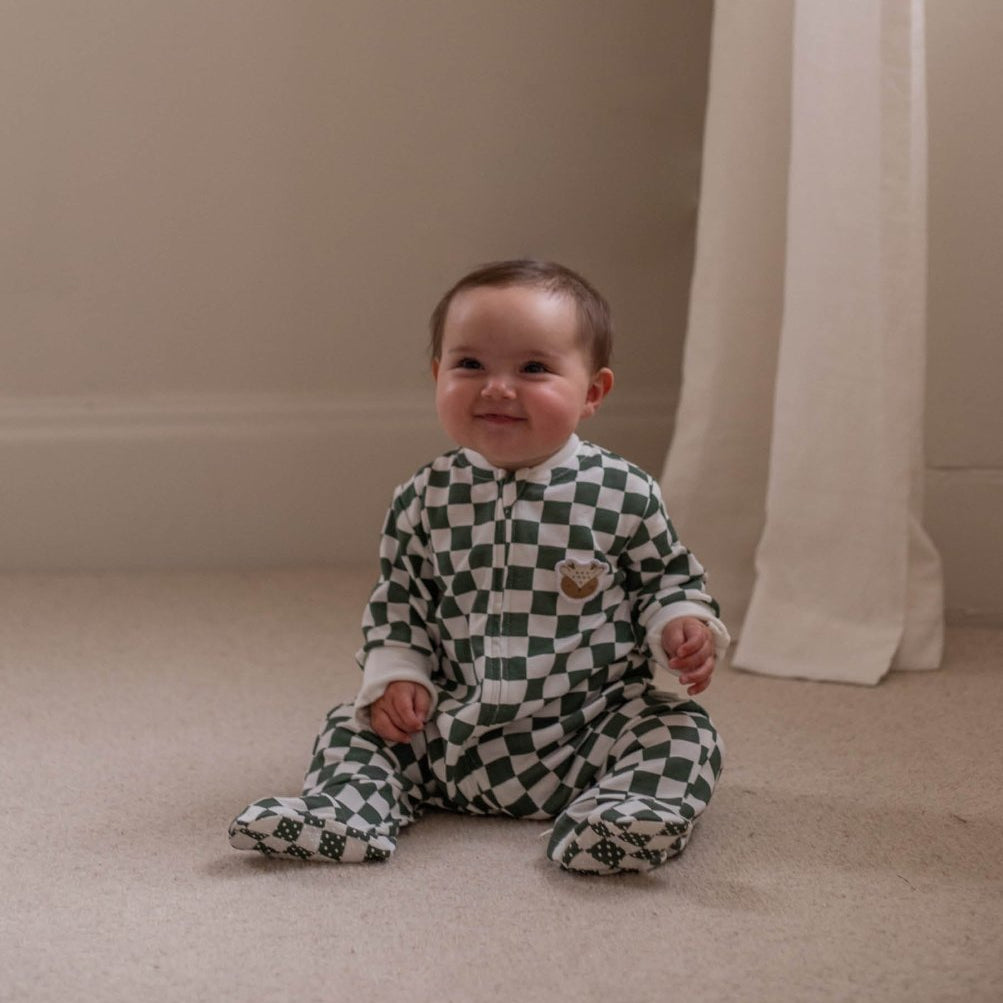 Avery Row Christmas Baby Jersey Sleepsuit - Green Checkerboard – Baby Clothing for children, available at Learning Bugs UK