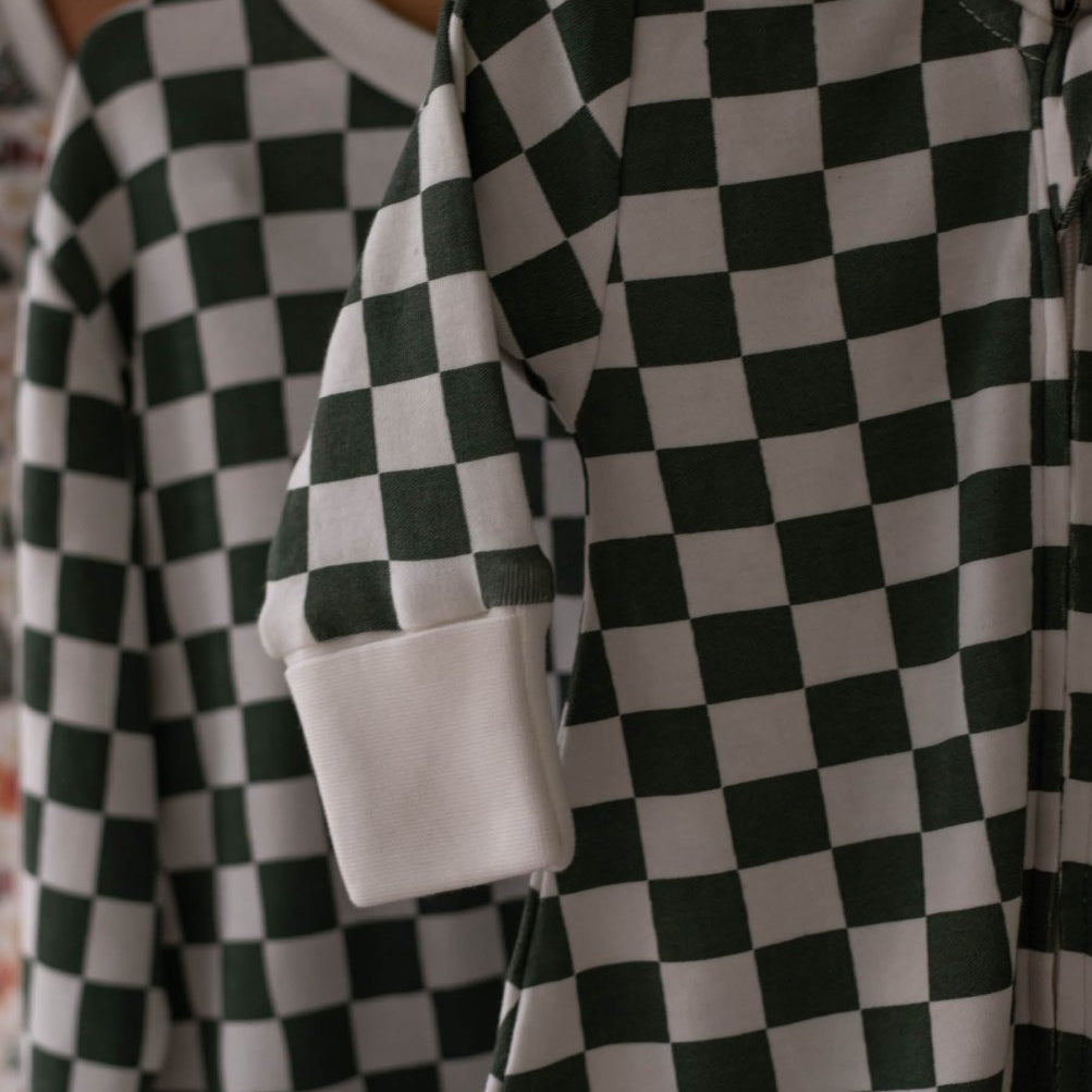 Avery Row Christmas Baby Jersey Sleepsuit - Green Checkerboard – Baby Clothing for children, available at Learning Bugs UK