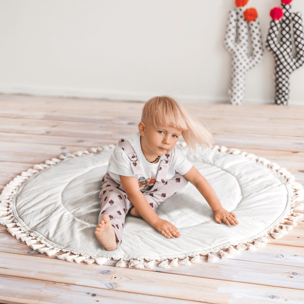 MINICAMP Padded Kids Play Mat in Ecru with Tassels – Playmats for children, available at Learning Bugs UK