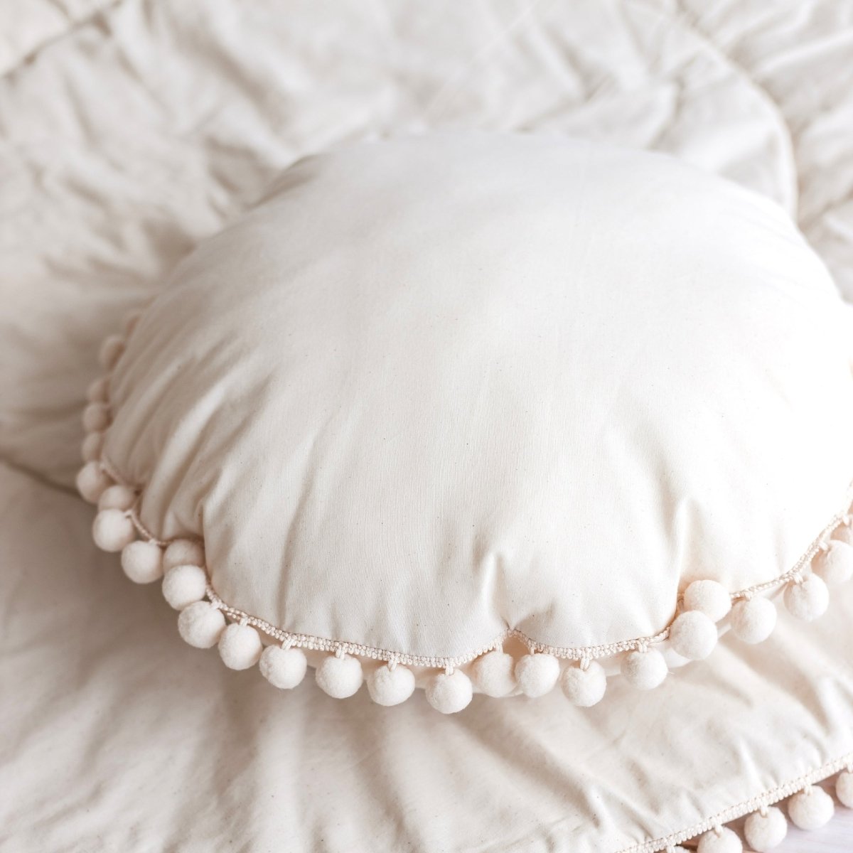 MINICAMP Throw Pillow in Ecru with Pompom trim – Decorative Pillows for children, available at Learning Bugs UK