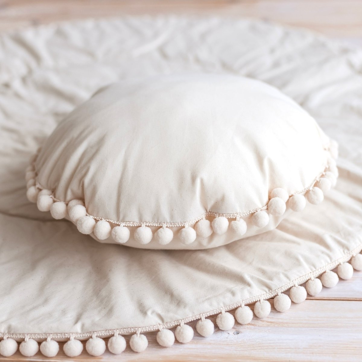 MINICAMP Throw Pillow in Ecru with Pompom trim – Decorative Pillows for children, available at Learning Bugs UK