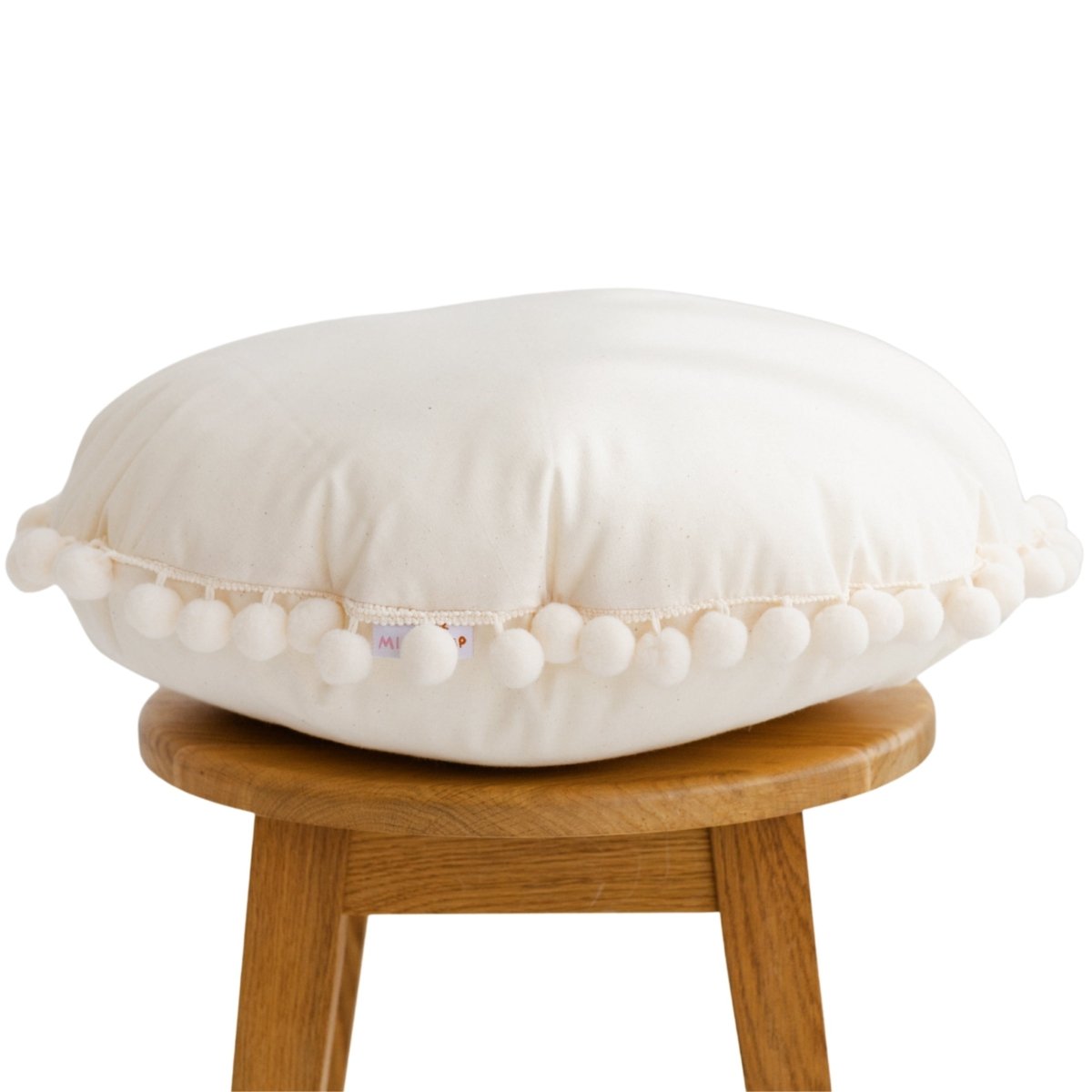 MINICAMP Throw Pillow in Ecru with Pompom trim – Decorative Pillows for children, available at Learning Bugs UK