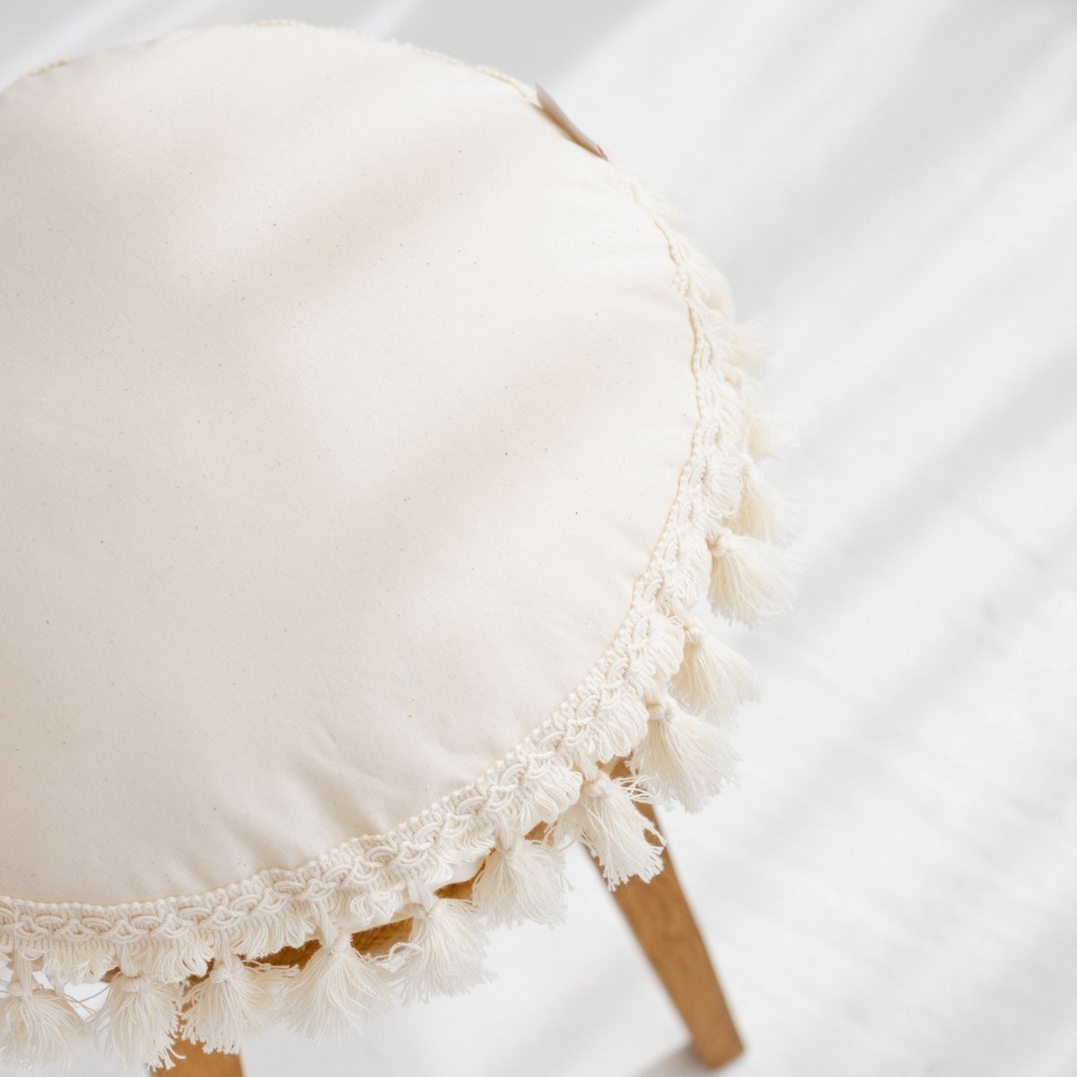 MINICAMP Round Tassel Cushion – Cozy Boho Pillow for Kids' Rooms – Decorative Pillows for children, available at Learning Bugs UK