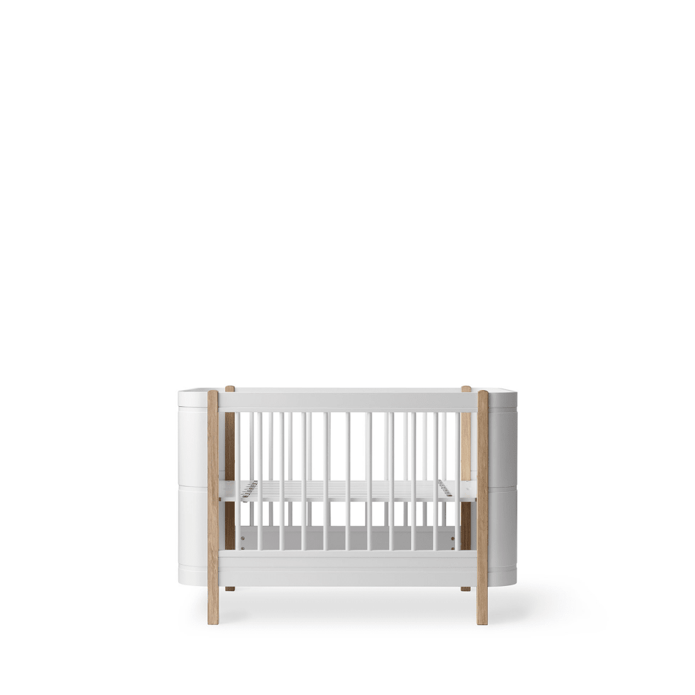 Mini+ Cot Bed Incl. Junior Kit - White/Oak (0-9 Years) – Cot Beds for children, available at Learning Bugs UK