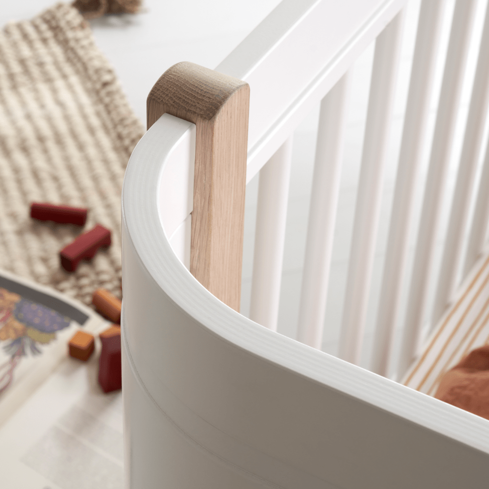Mini+ Cot Bed Incl. Junior Kit - White/Oak (0-9 Years) – Cot Beds for children, available at Learning Bugs UK