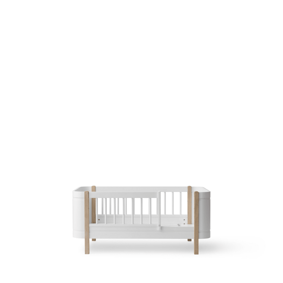 Mini+ Cot Bed Incl. Junior Kit - White/Oak (0-9 Years) – Cot Beds for children, available at Learning Bugs UK