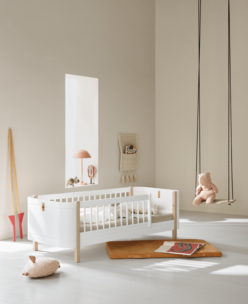 Mini+ Cot Bed Incl. Junior Kit - White/Oak (0-9 Years) – Cot Beds for children, available at Learning Bugs UK
