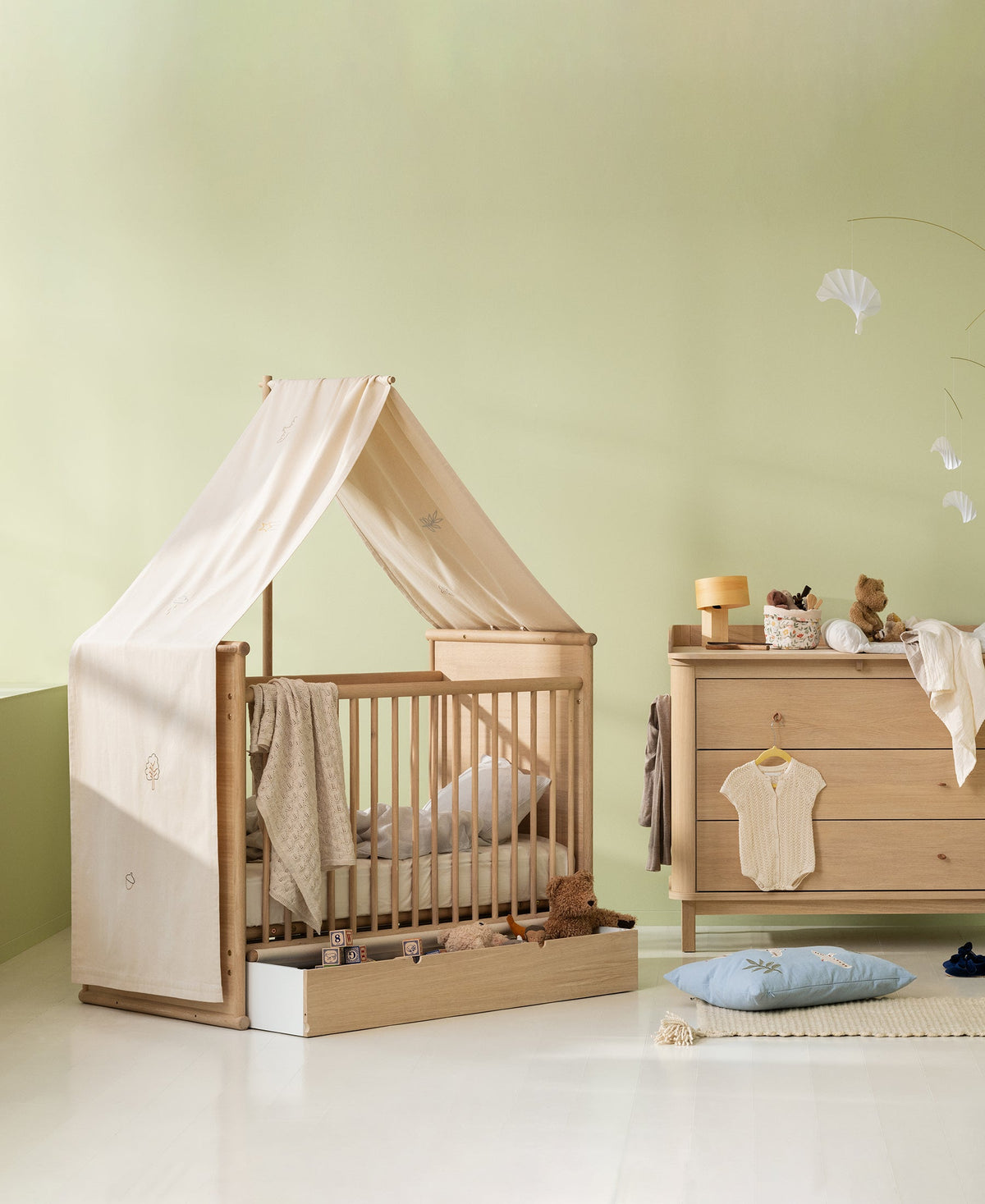 Oliver Furniture Camp Novel cot bed with canopy holder and embroidered canopy, available at Learning Bugs UK