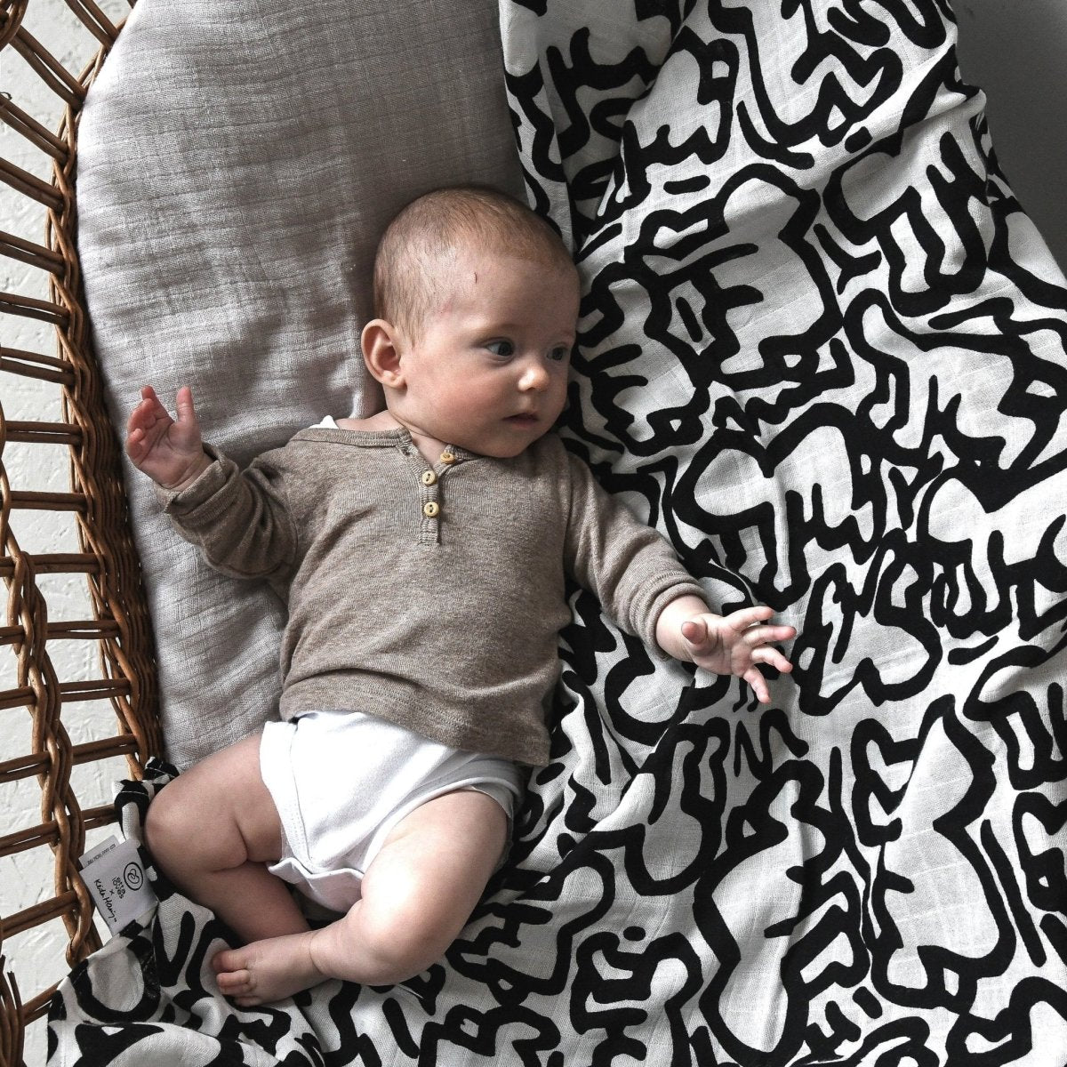 ETTA LOVES x KEITH HARING Muslin Blanket - reversible – Blankets for children, available at Learning Bugs UK