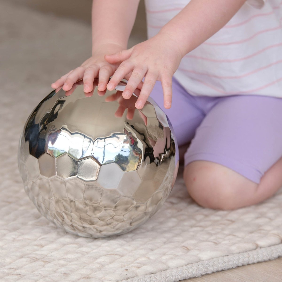 Sensory Steel Tumble Ball – Baby Toys & Activity Equipment for children, available at Learning Bugs UK