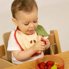 Oli&Carol Pepa the Apple Feeding Bib – Tableware & Cutlery for children, available at Learning Bugs UK