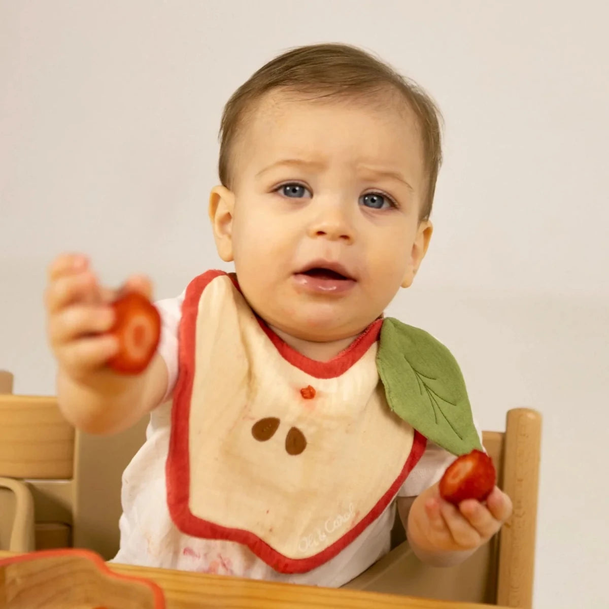 Oli&Carol Pepa the Apple Feeding Bib – Tableware & Cutlery for children, available at Learning Bugs UK