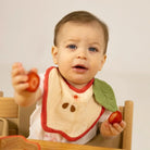 Oli&Carol Pepa the Apple Feeding Bib – Tableware & Cutlery for children, available at Learning Bugs UK