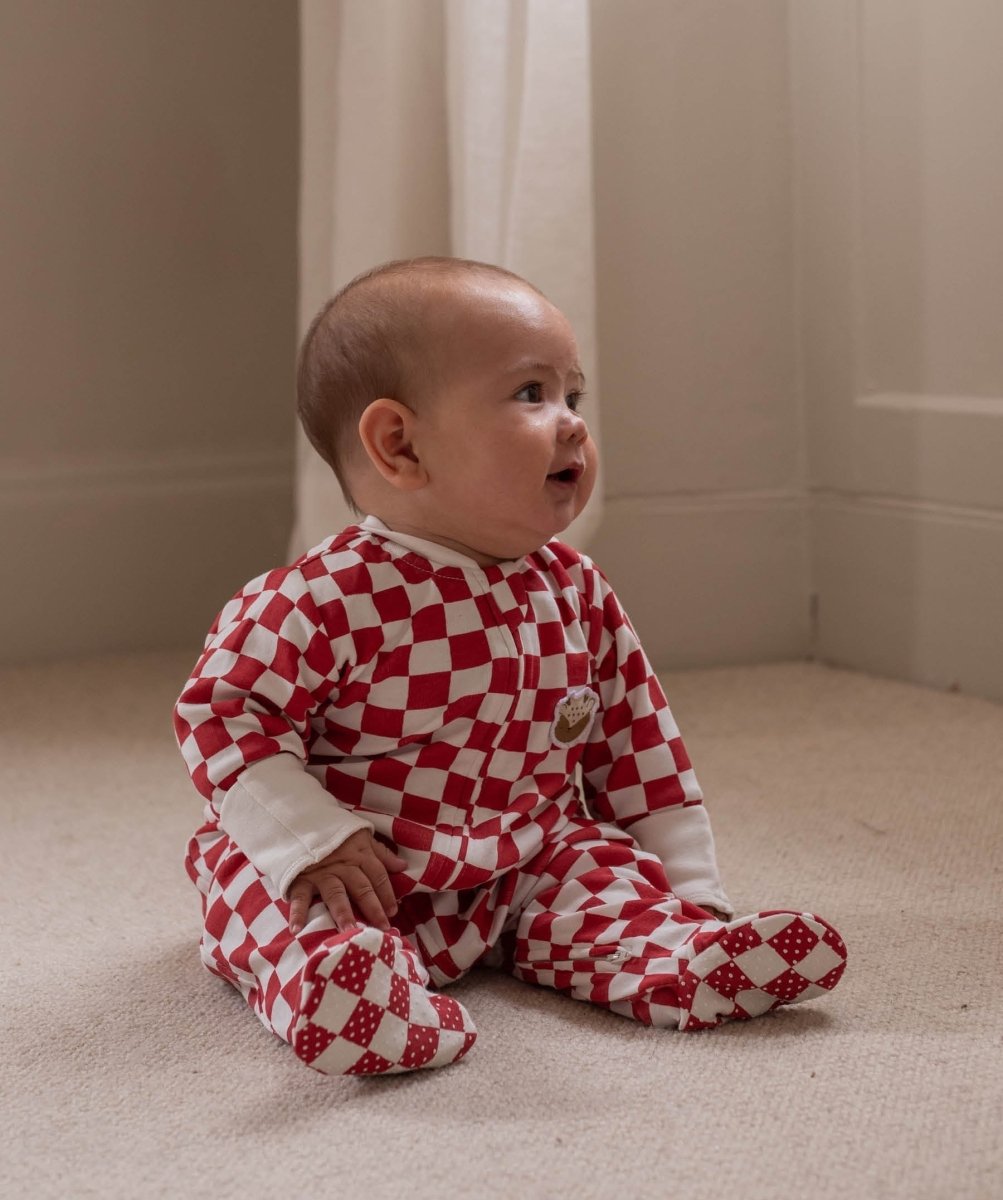Avery Row Christmas Baby Jersey Sleepsuit - Red Checkerboard – Baby Clothing for children, available at Learning Bugs UK