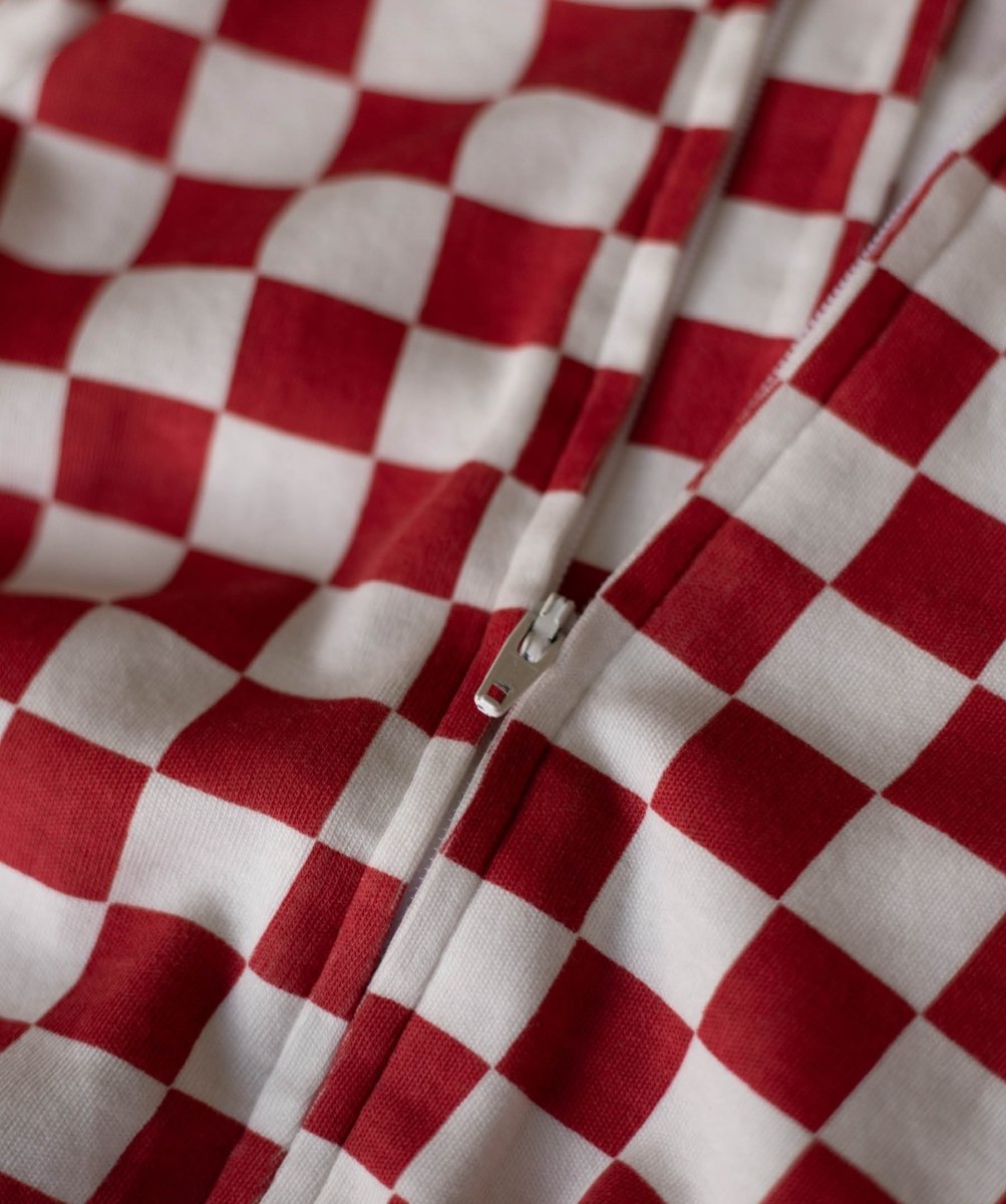 Avery Row Christmas Baby Jersey Sleepsuit - Red Checkerboard – Baby Clothing for children, available at Learning Bugs UK