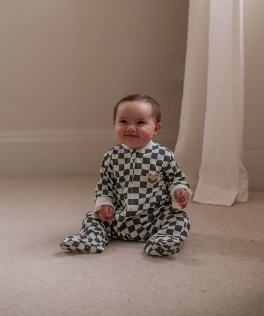 Avery Row Christmas Baby Jersey Sleepsuit - Green Checkerboard – Baby Clothing for children, available at Learning Bugs UK