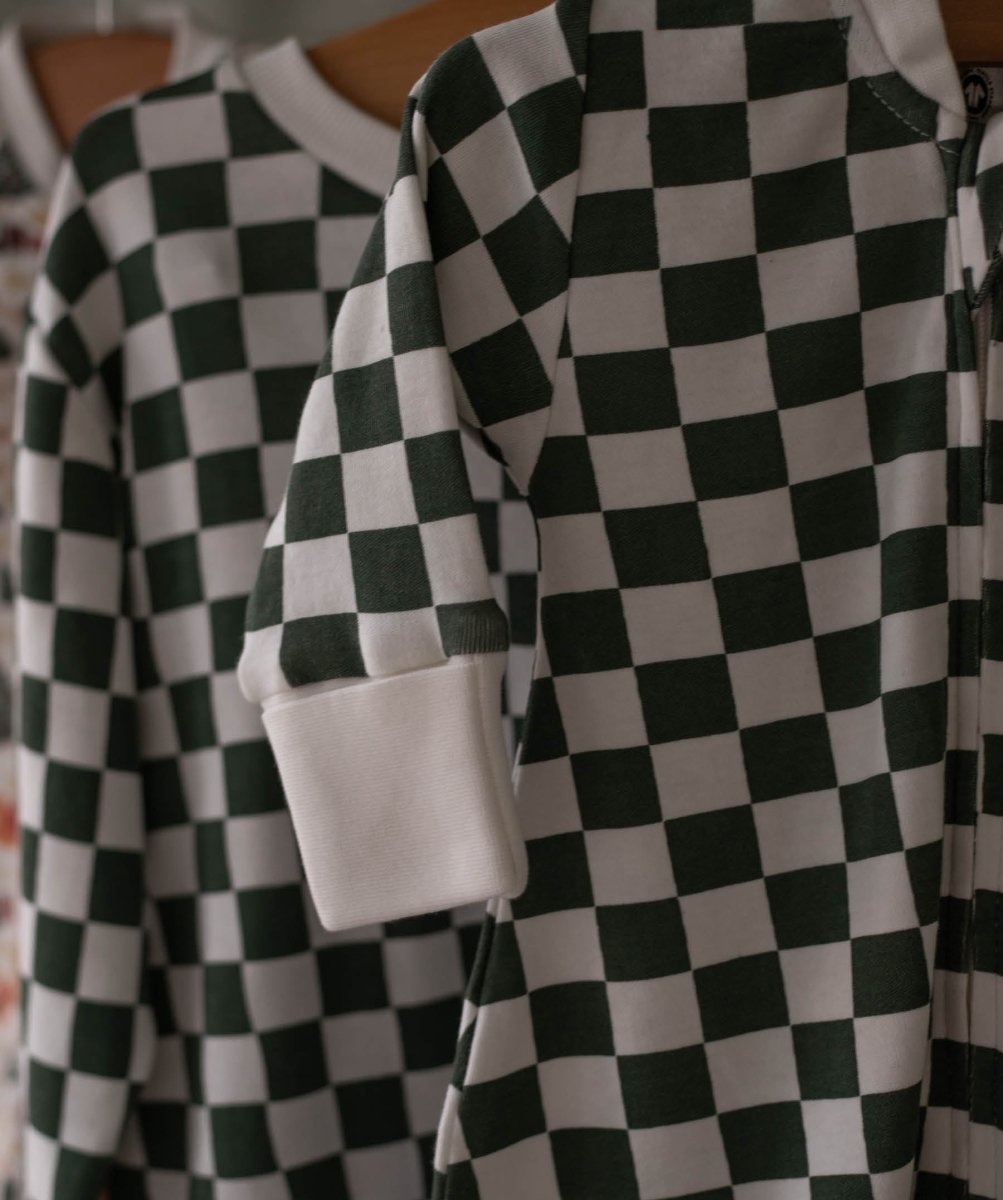 Avery Row Christmas Baby Jersey Sleepsuit - Green Checkerboard – Baby Clothing for children, available at Learning Bugs UK