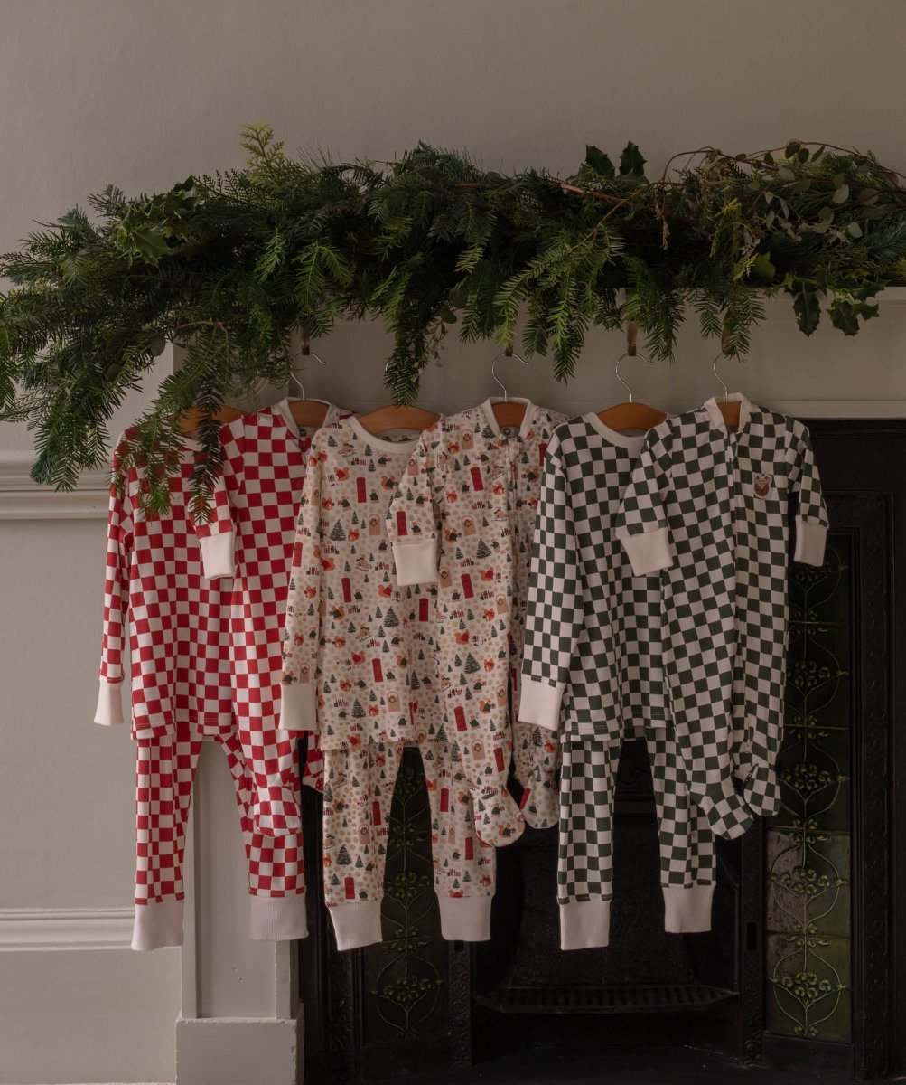 Avery Row Christmas Baby Jersey Sleepsuit - Green Checkerboard – Baby Clothing for children, available at Learning Bugs UK