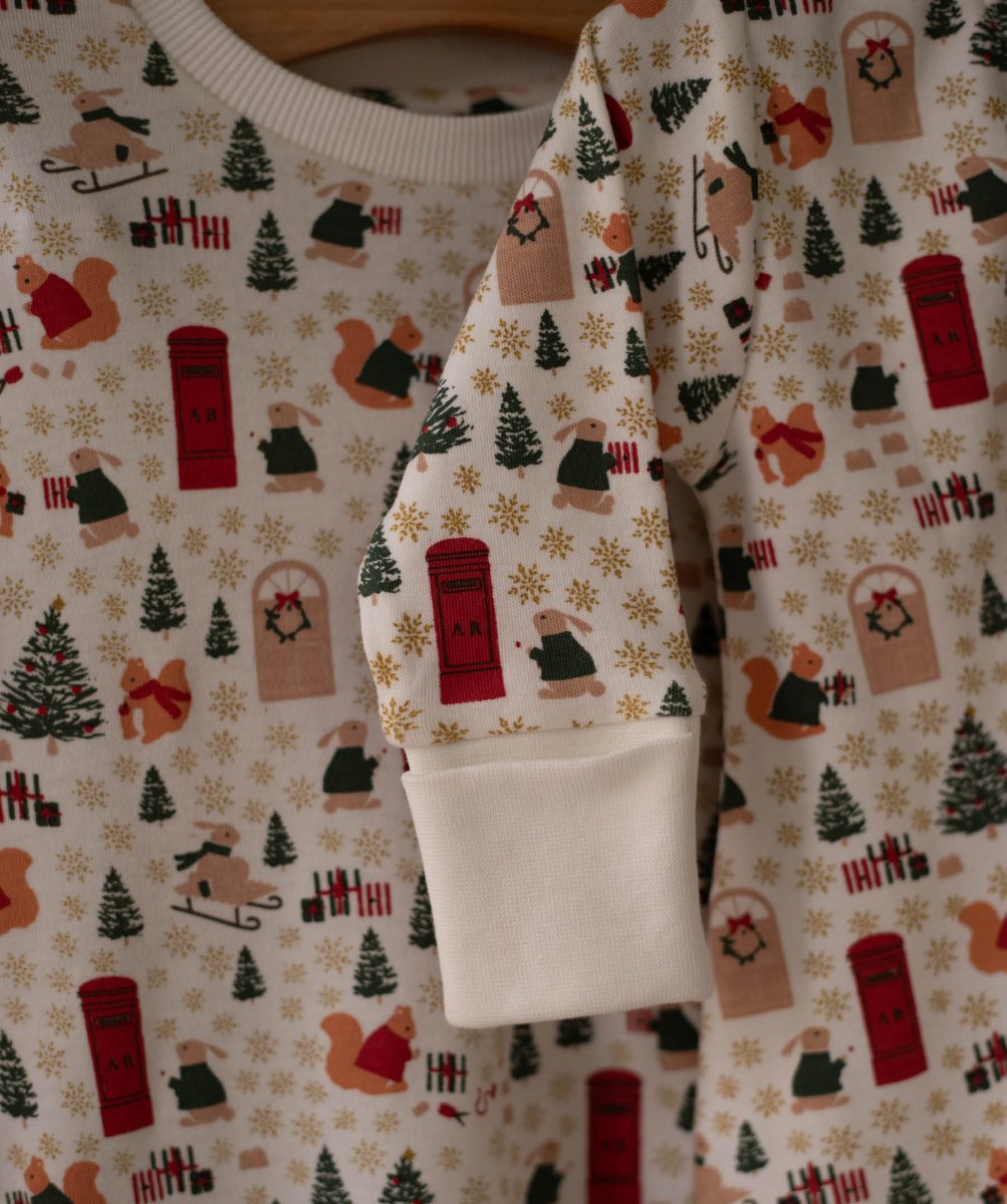 Avery Row Christmas Baby Jersey Sleepsuit - Festive Forest – Baby Clothing for children, available at Learning Bugs UK