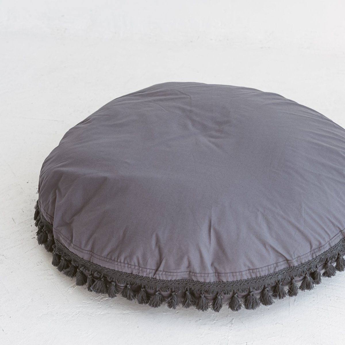 MINICAMP Large Floor Cushion with Tassels in Grey – Floor Pillows for children, available at Learning Bugs UK