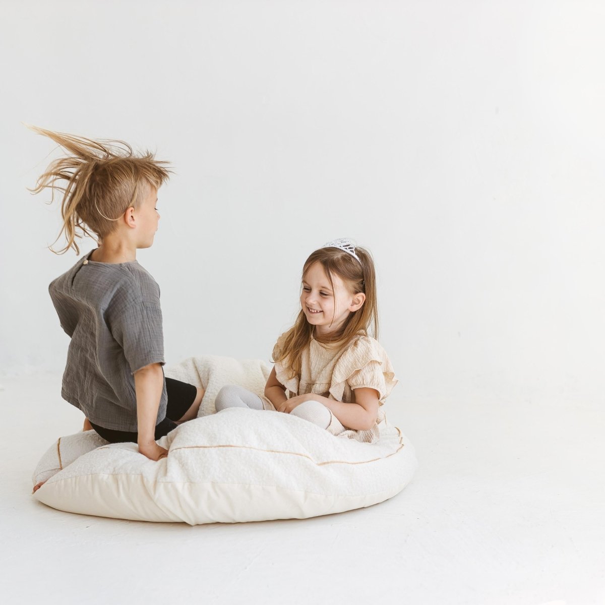 MINICAMP Boucle Fabric Kids Floor Cushion in Ecru – Floor Pillows for children, available at Learning Bugs UK