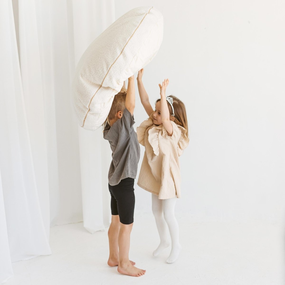 MINICAMP Boucle Fabric Kids Floor Cushion in Ecru – Floor Pillows for children, available at Learning Bugs UK