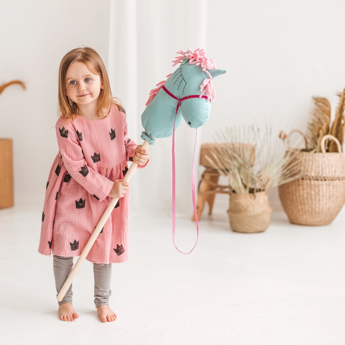 MINICAMP Unicorn Hobby Horse Stick Toy in Turquoise – for children, available at Learning Bugs UK