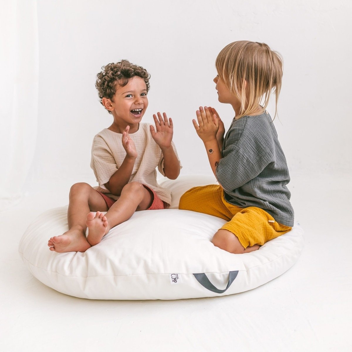 MINICAMP Lounger Floor Pillow with Handle – Floor Pillows for children, available at Learning Bugs UK