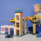 Buy Multi Level Garage with Lift | Wooden garage playset + cars for kids by Learning Bugs UK