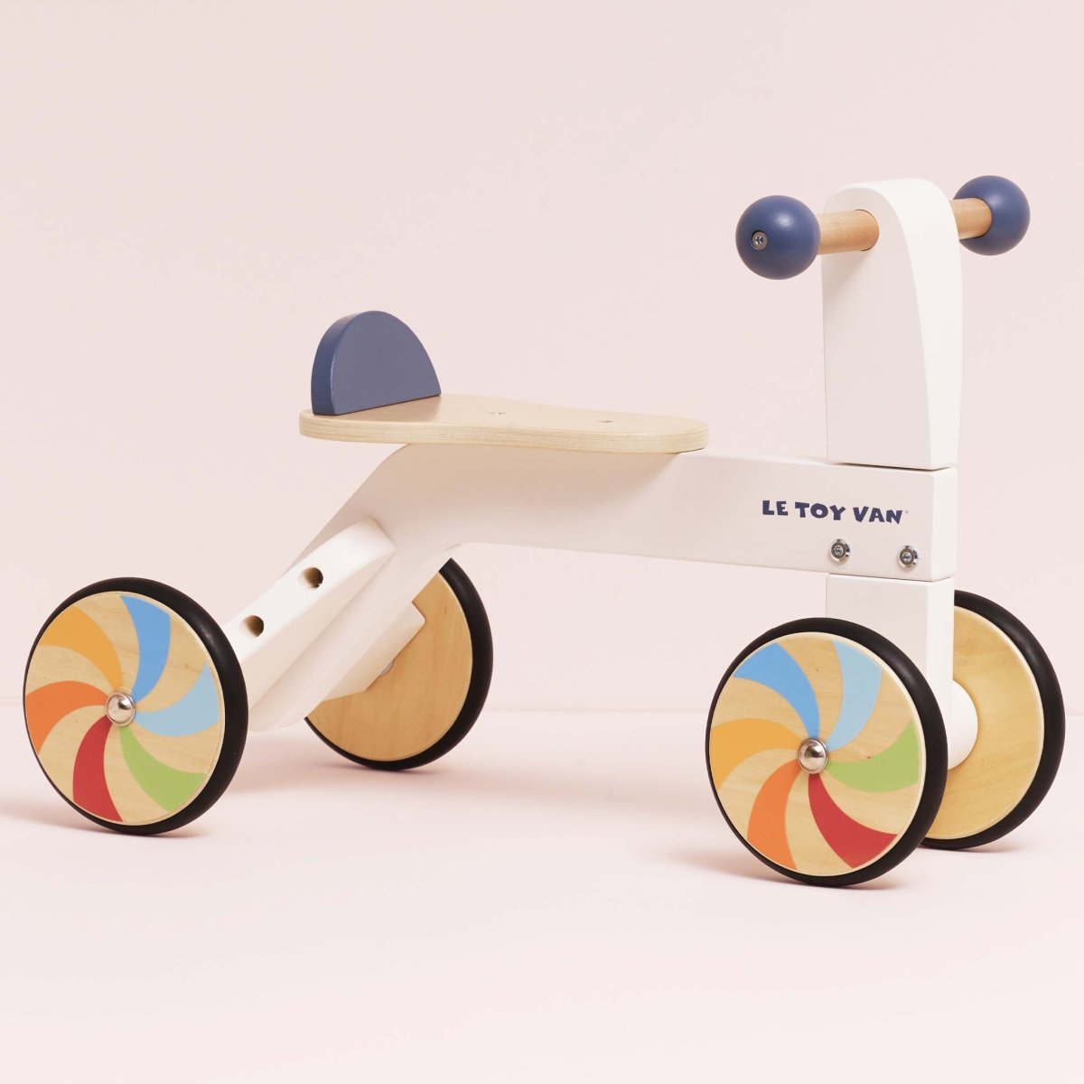 Le Toy Van Wooden Rainbow Ride On Trike – Push & Pedal Riding Vehicles for children, available at Learning Bugs UK
