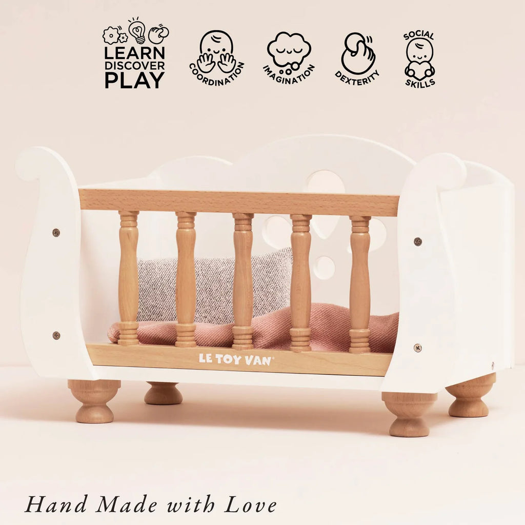 Le Toy Van Doll's Wooden Cot – for children, available at Learning Bugs UK