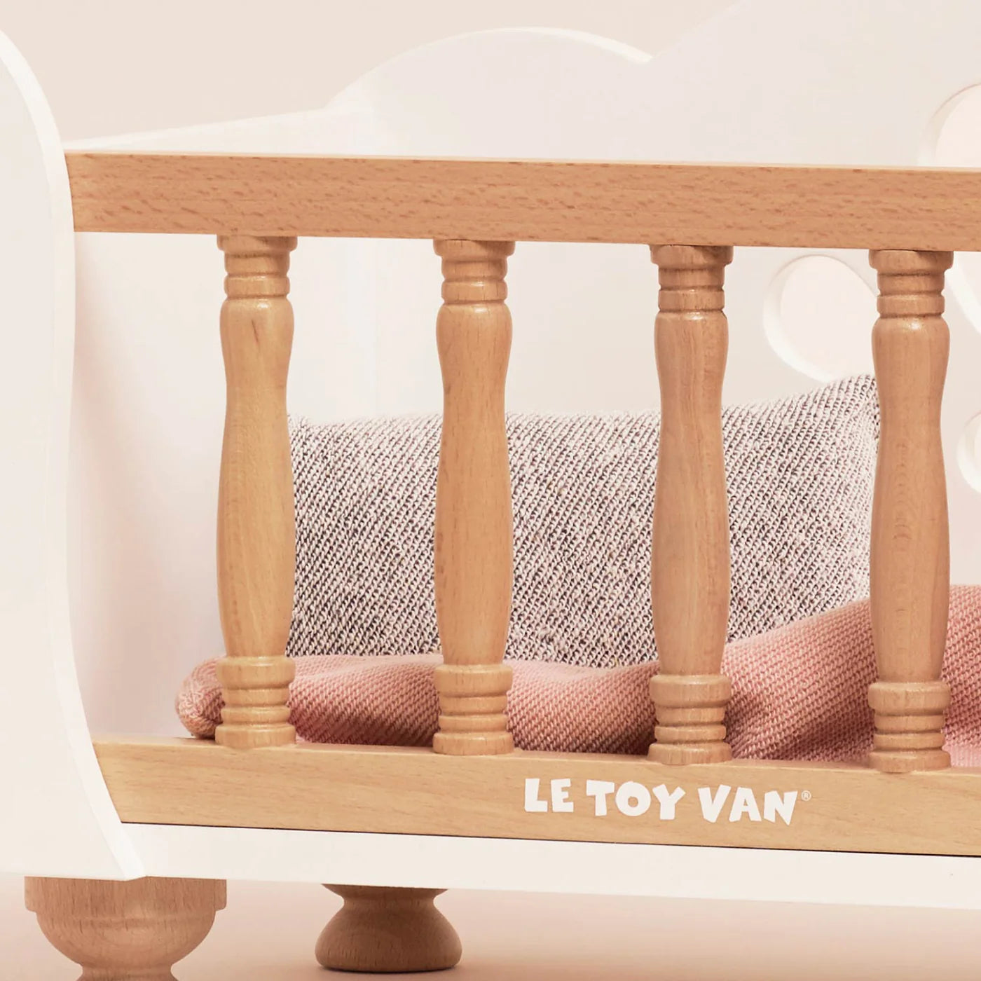 Le Toy Van Doll's Wooden Cot – for children, available at Learning Bugs UK