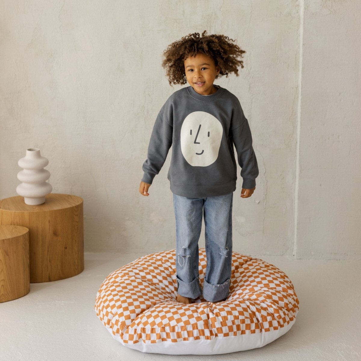 MINICAMP Checkered Large Kids Floor Cushion in Off-white and Orange – Floor Pillows for children, available at Learning Bugs UK